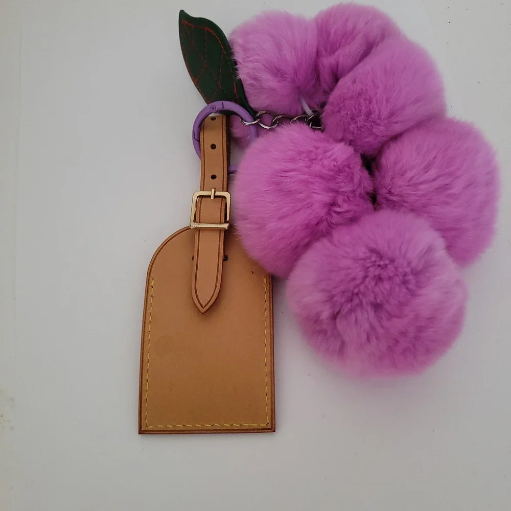 Louis Vuitton Vachetta Leather Luggage Tag & Purple Faux Fur Pom Pom Charm Set